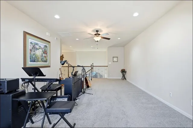 a bath tub sitting in a bathroom and mirror