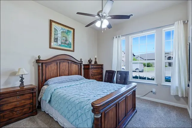 a view of hallway with wooden floor
