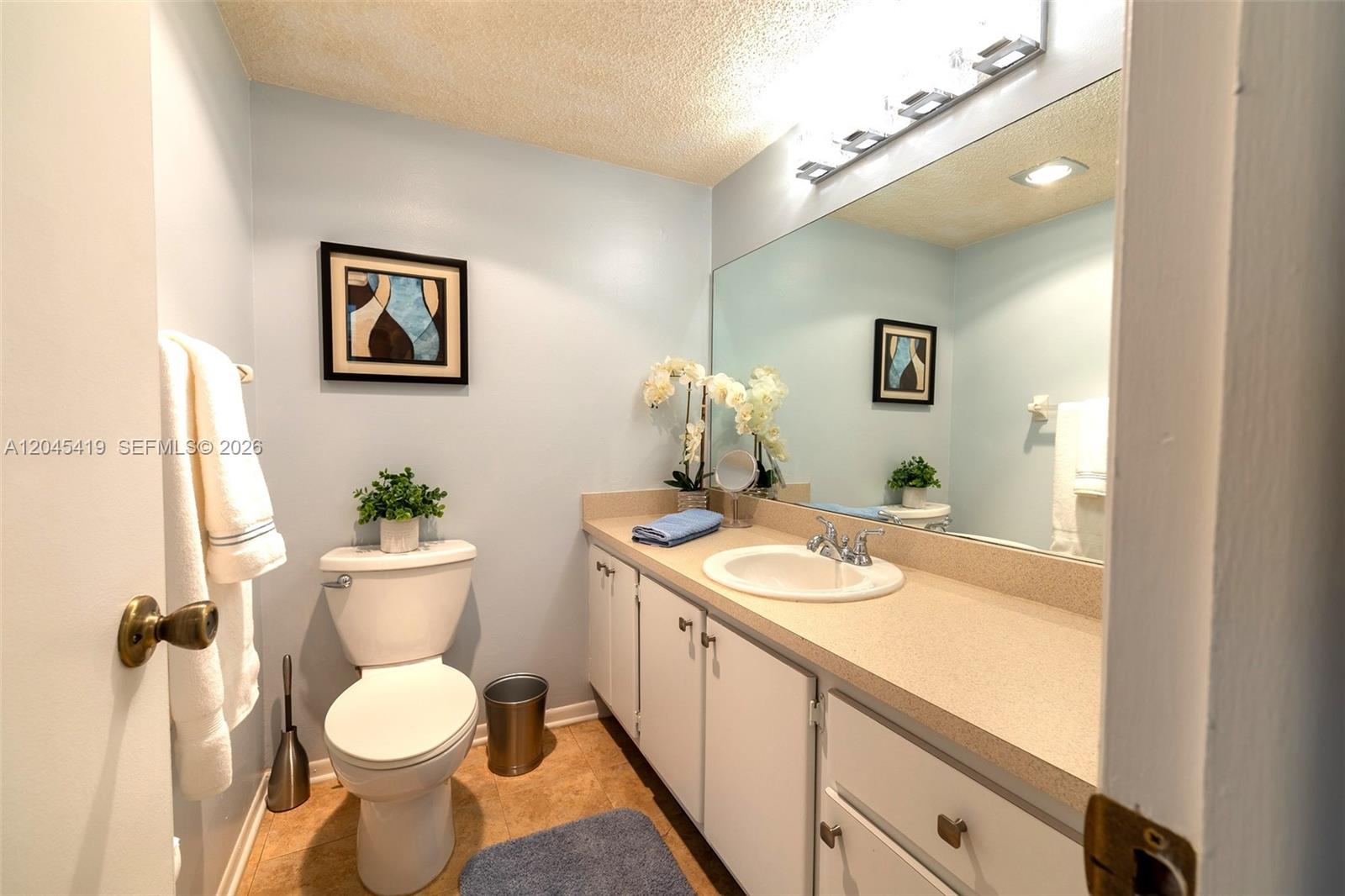 8814 West McNab Road, Unit 204 Tamarac, FL 33321 - Photo 16 of 23 Bathroom