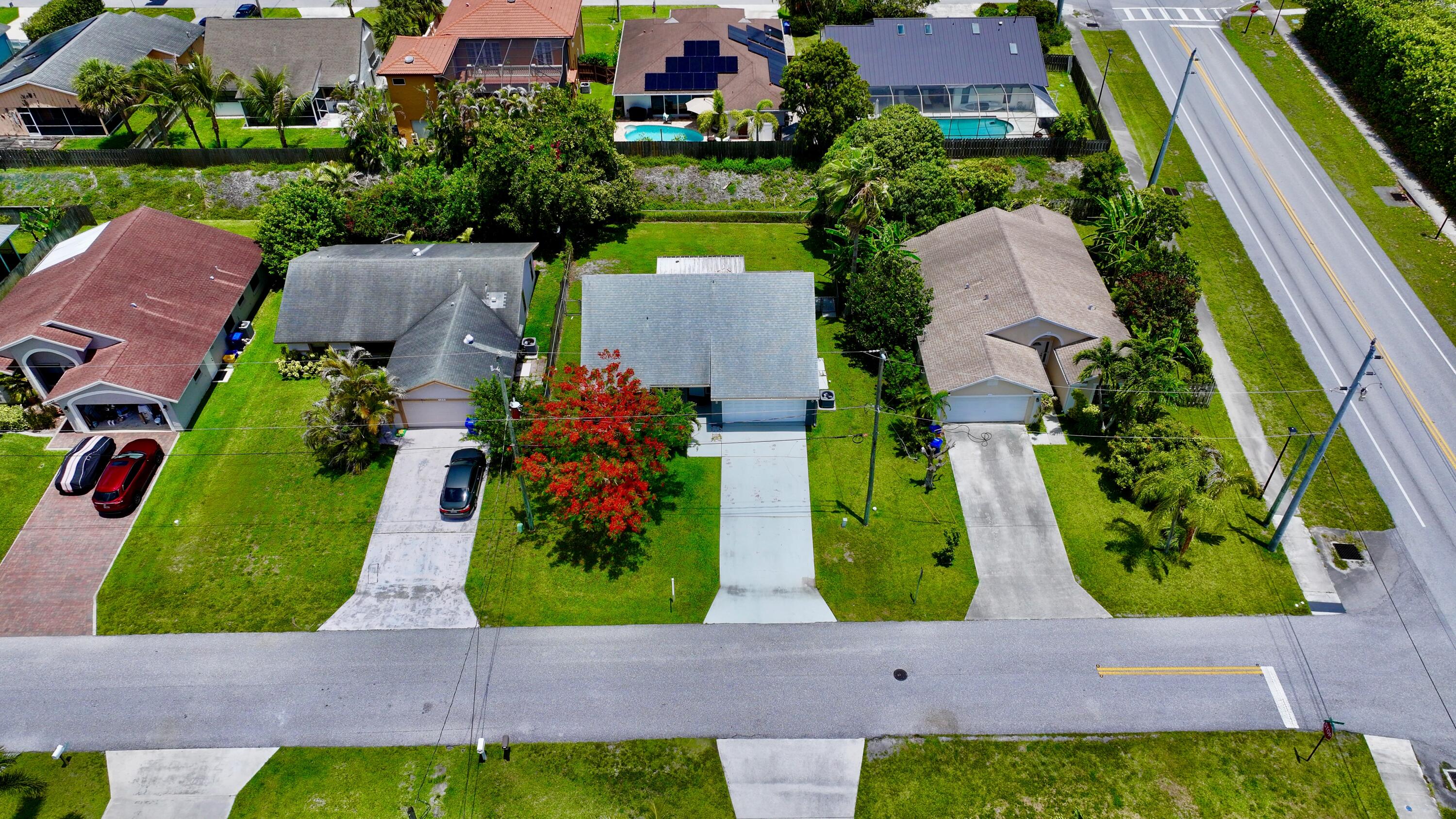 6048 Garrett Street Jupiter, FL 33458 - Photo 4 of 101 dji_fly_20260522_124924_0942_17794719013