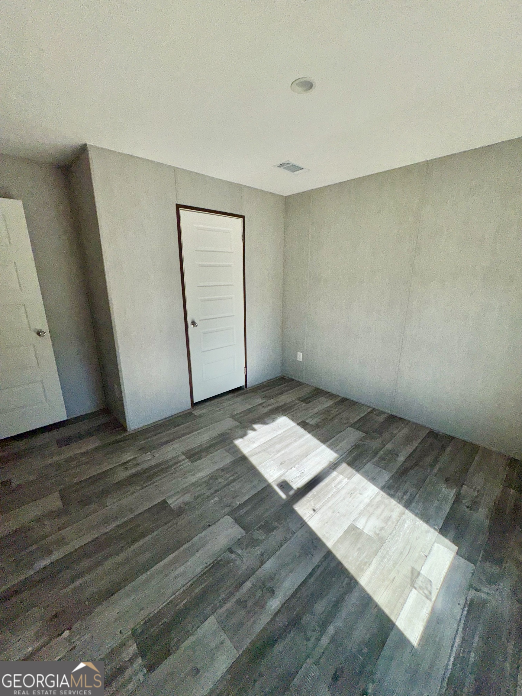 589 Ben Jackson Road Vidalia, GA 30474 - Photo 12 of 17 wooden floor in a room