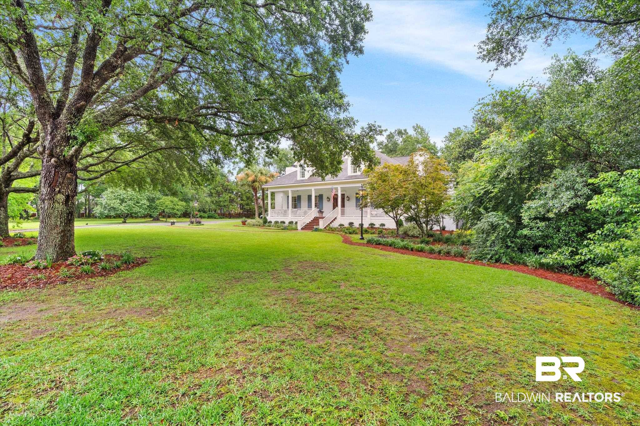 6458 Raintree Road Fairhope, AL 36532 - Photo 49 of 65 View of yard with a porch