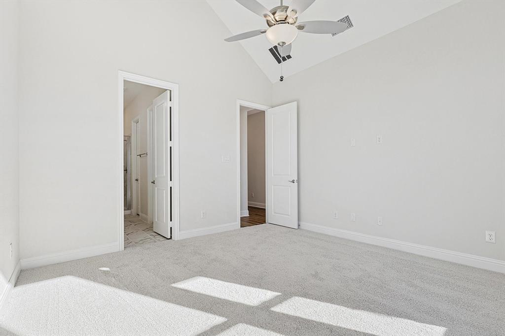 11458 Chartwell Court Frisco, TX 75035 - Photo 16 of 32 an empty room with a empty space and a ceiling fan