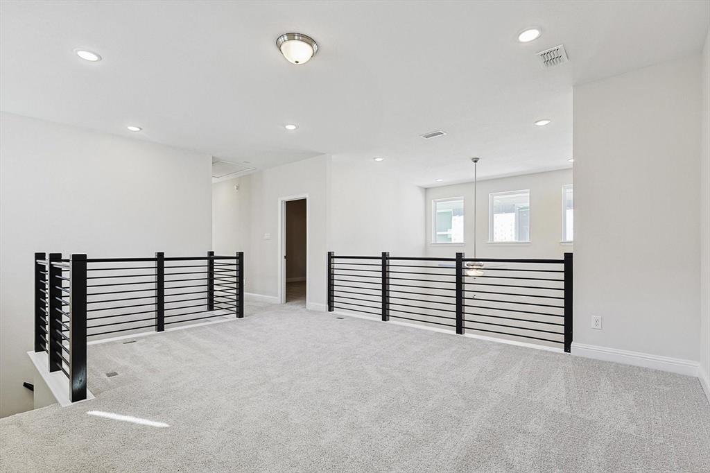 11458 Chartwell Court Frisco, TX 75035 - Photo 20 of 32 an empty room with wooden floor and windows