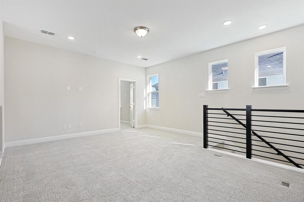 11458 Chartwell Court Frisco, TX 75035 - Photo 22 of 32 a view of a livingroom with a staircase