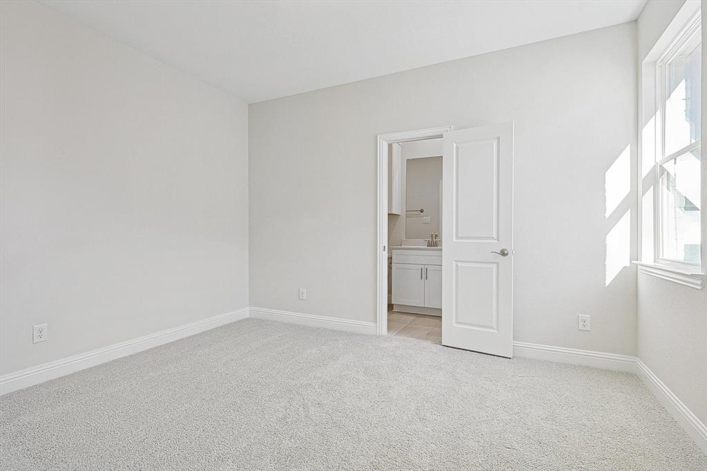 11458 Chartwell Court Frisco, TX 75035 - Photo 23 of 32 an empty room with windows and closet