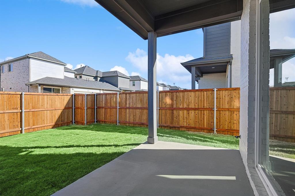 11458 Chartwell Court Frisco, TX 75035 - Photo 29 of 32 a view of a house with a yard