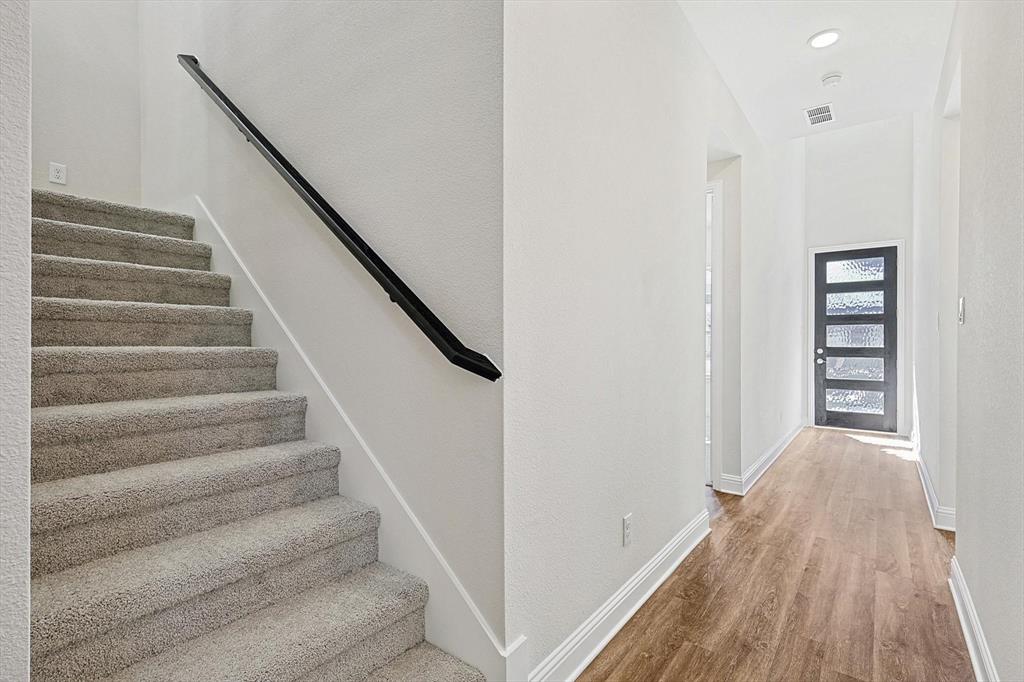 11458 Chartwell Court Frisco, TX 75035 - Photo 5 of 32 a view of entryway with wooden floor