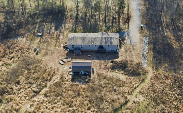 a view of a back yard of the house
