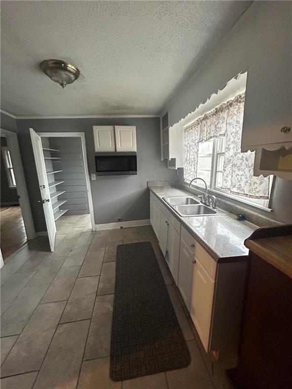 1900 Panola Road Lithonia, GA 30058 - Photo 7 of 11 a kitchen with a sink and a stove top oven