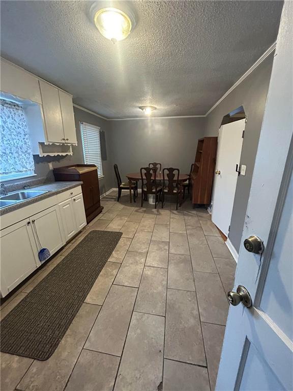 1900 Panola Road Lithonia, GA 30058 - Photo 8 of 11 a large white kitchen with a sink and a stove top oven