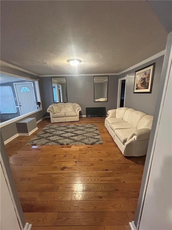 1900 Panola Road Lithonia, GA 30058 - Photo 9 of 11 a bedroom with a bed and wooden floor