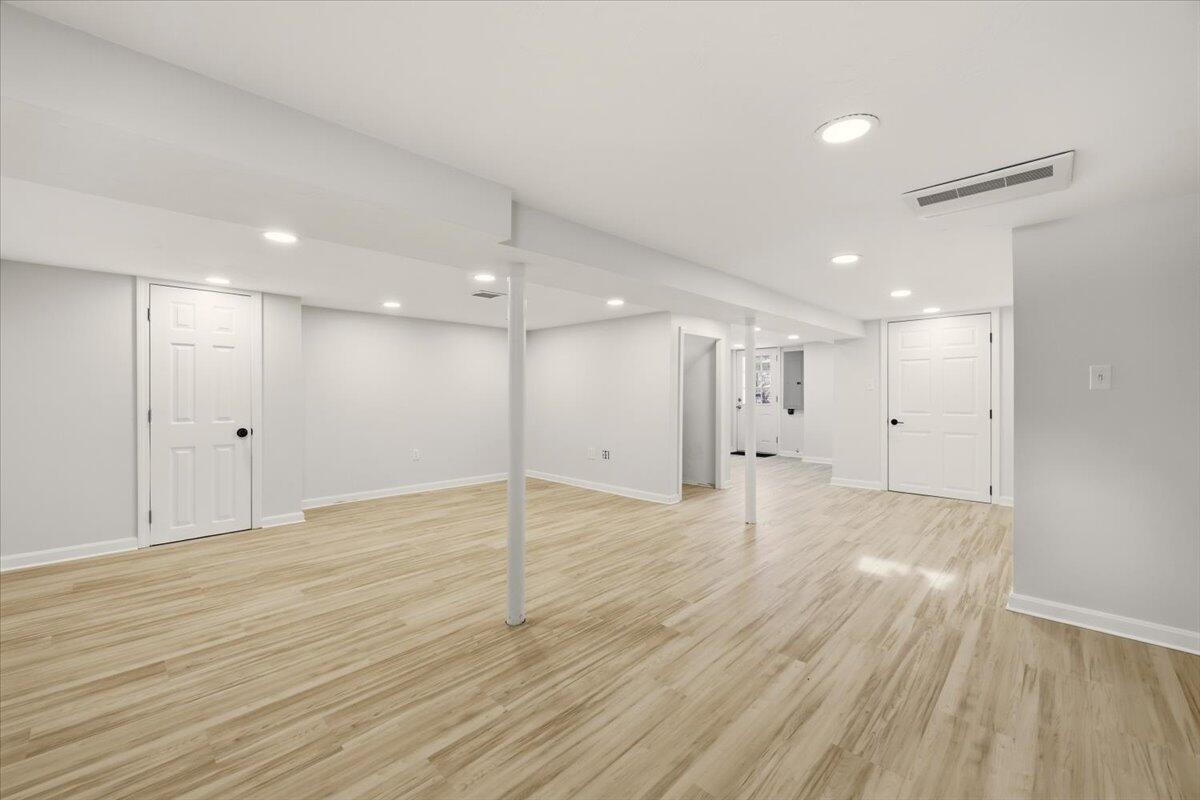 9 Blissful Lane East Wareham, MA 02538 - Photo 31 of 45 a view of an empty room with wooden floor