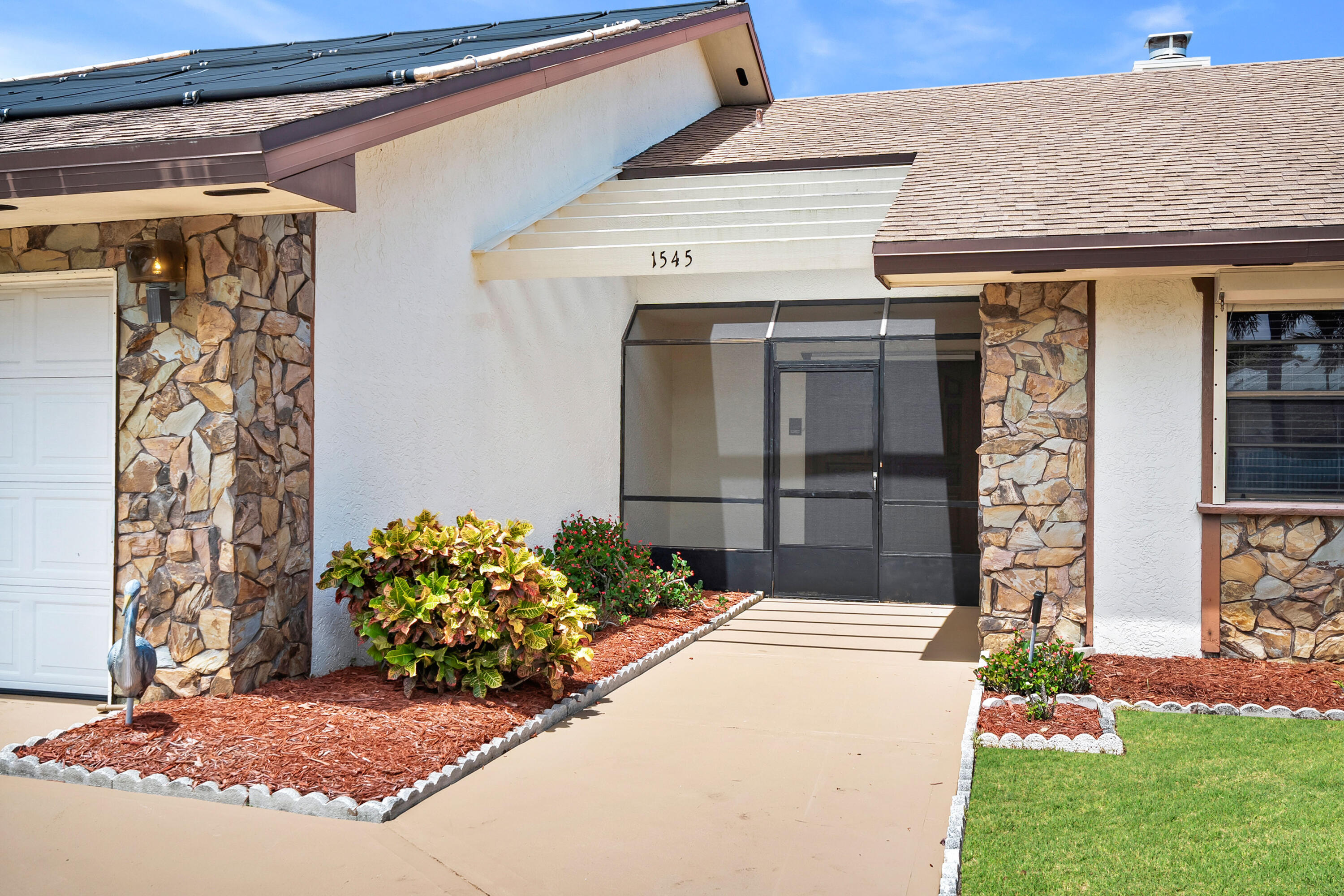 1545 Southwest Dyer Point Road Palm City, FL 34990 - Photo 11 of 44 Screened-in front porch.