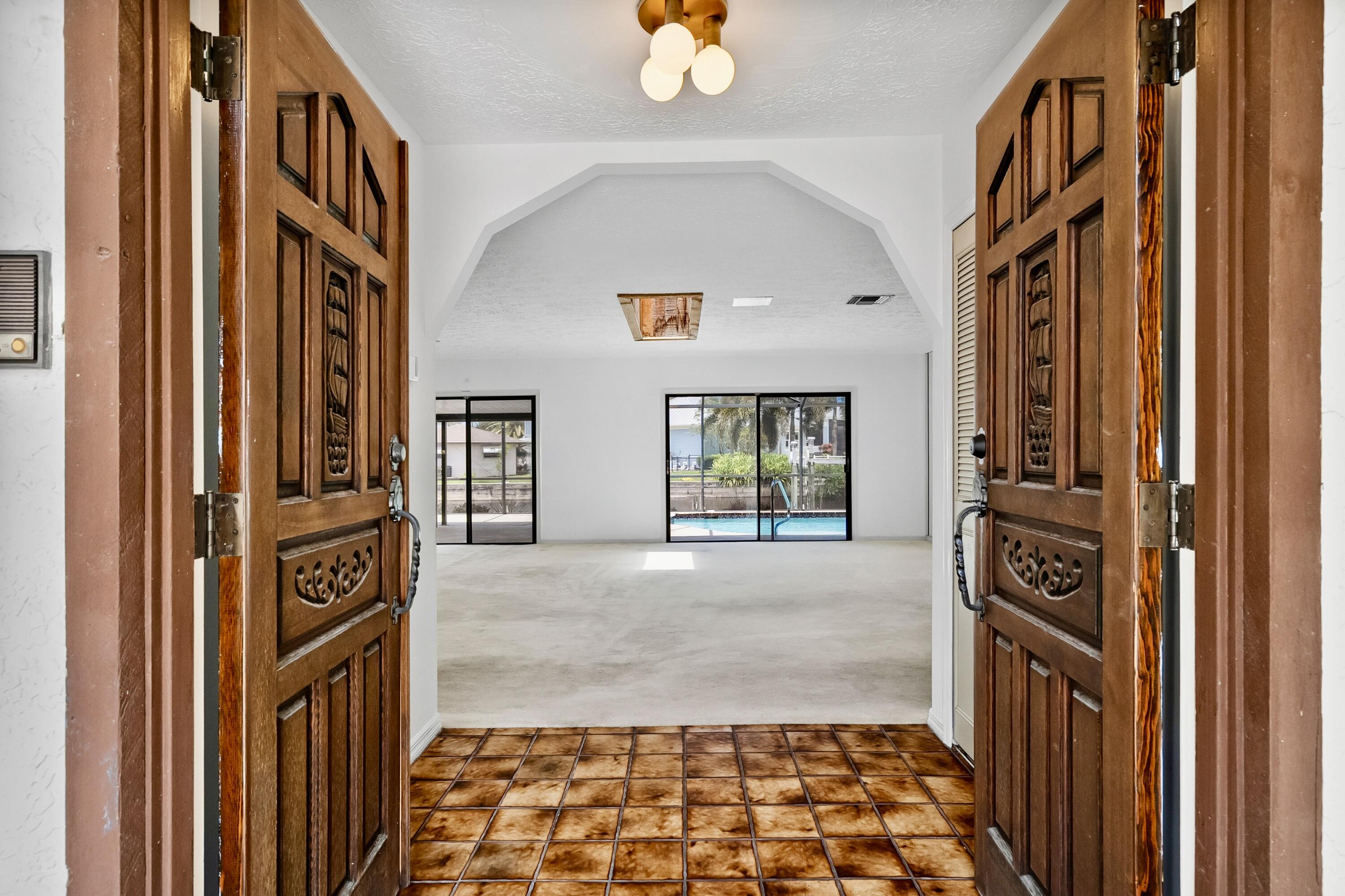 1545 Southwest Dyer Point Road Palm City, FL 34990 - Photo 12 of 44 Majestic entrance to the Great Room.