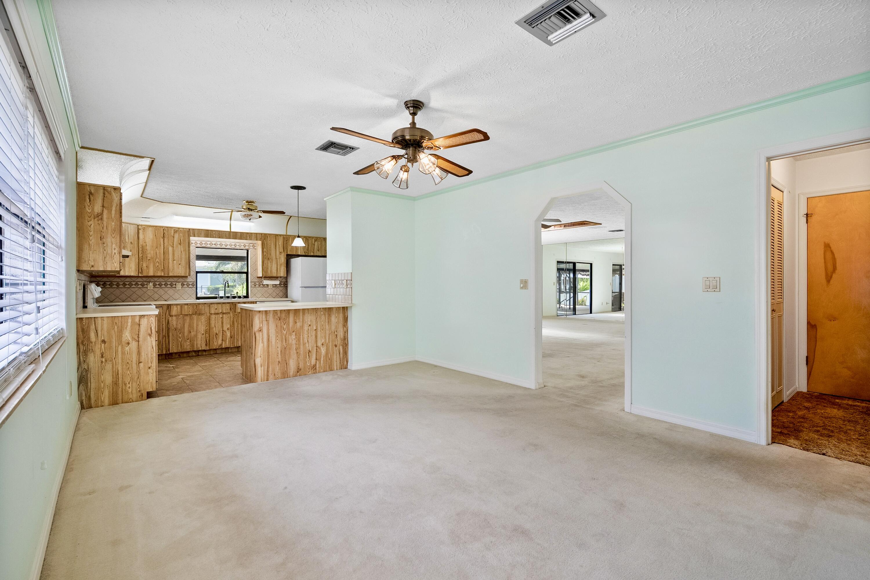 1545 Southwest Dyer Point Road Palm City, FL 34990 - Photo 22 of 44 Dining room-bright and spacious.