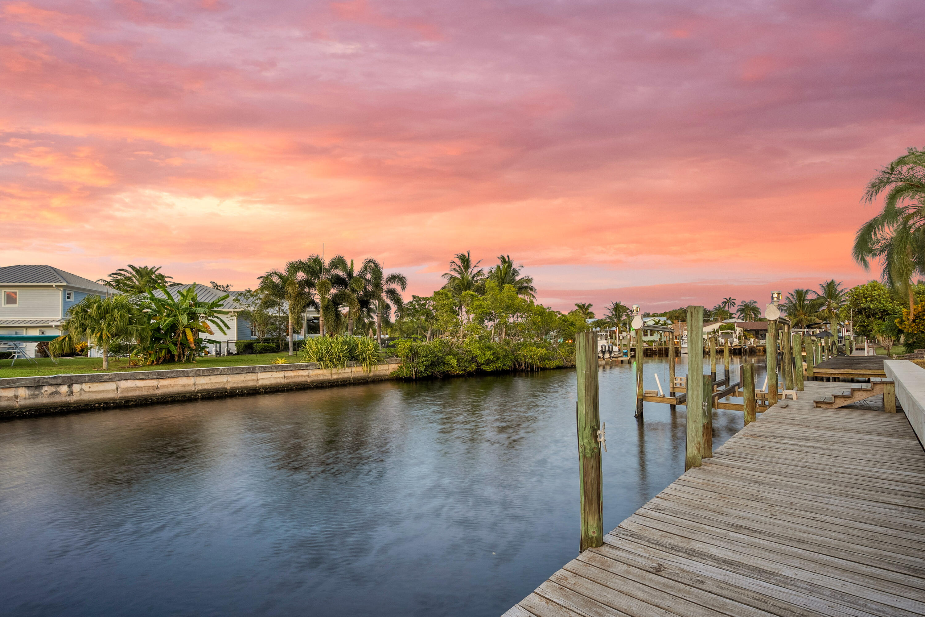1545 Southwest Dyer Point Road Palm City, FL 34990 - Photo 3 of 44 Golden hour on the dock.