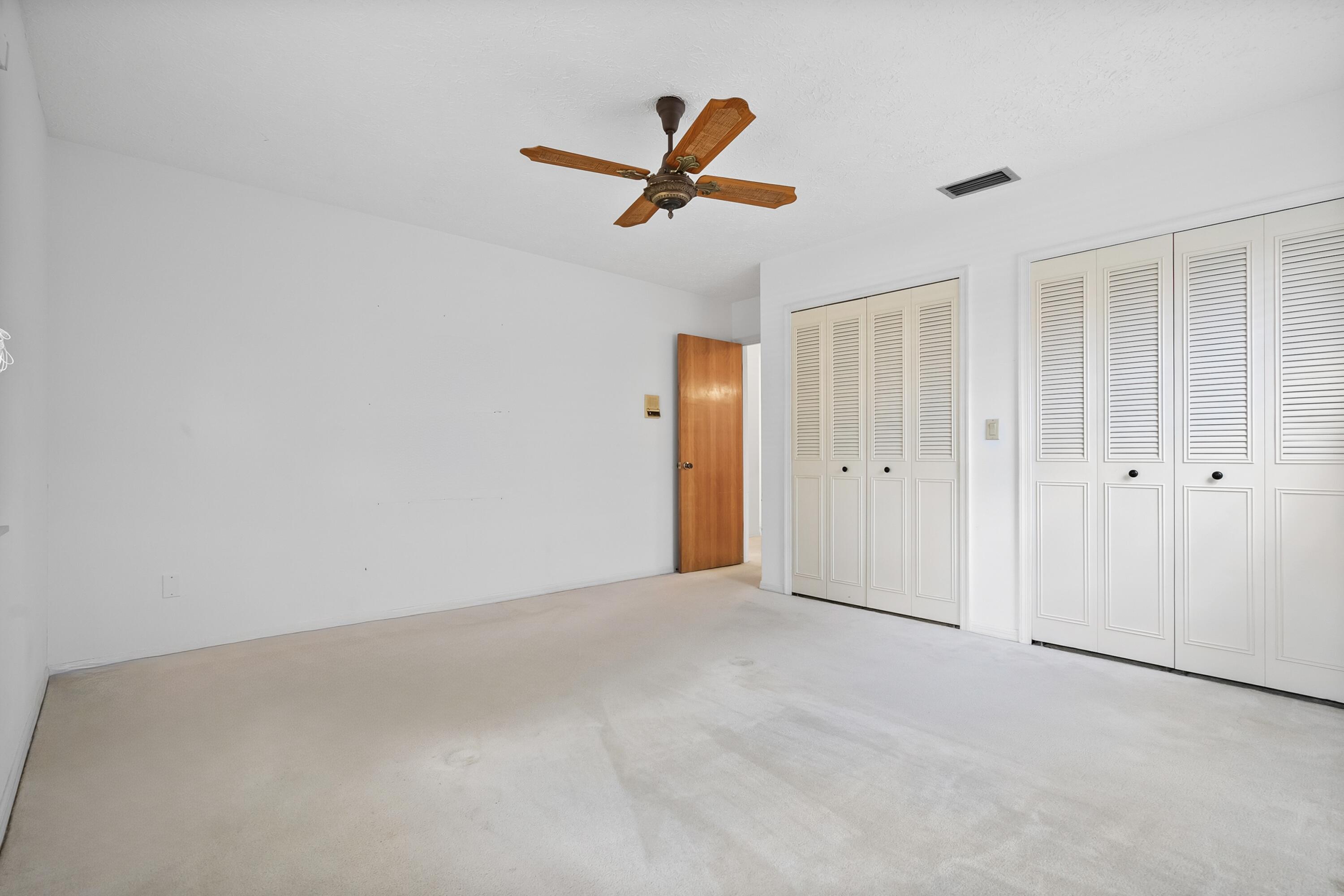 1545 Southwest Dyer Point Road Palm City, FL 34990 - Photo 34 of 44 Bedroom 2