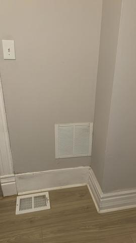 7726 South Maryland Avenue Chicago, IL 60619 - Photo 13 of 17 a view of a room with racks on the wall