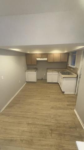 7726 South Maryland Avenue Chicago, IL 60619 - Photo 8 of 17 a room with table and chairs