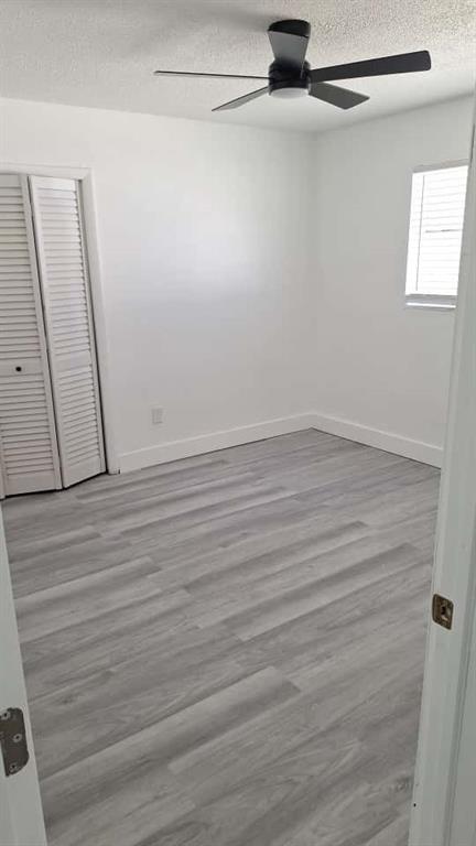 1555 Northeast 148th Street Miami, FL 33161 - Photo 10 of 14 a view of a room with wooden floor