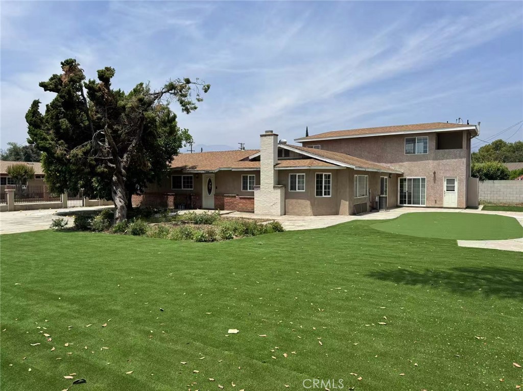 11849 Lower Azusa Road El Monte, CA 91732 - Photo 1 of 1 a view of a house with a backyard