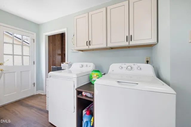 a utility room with dryer and washer