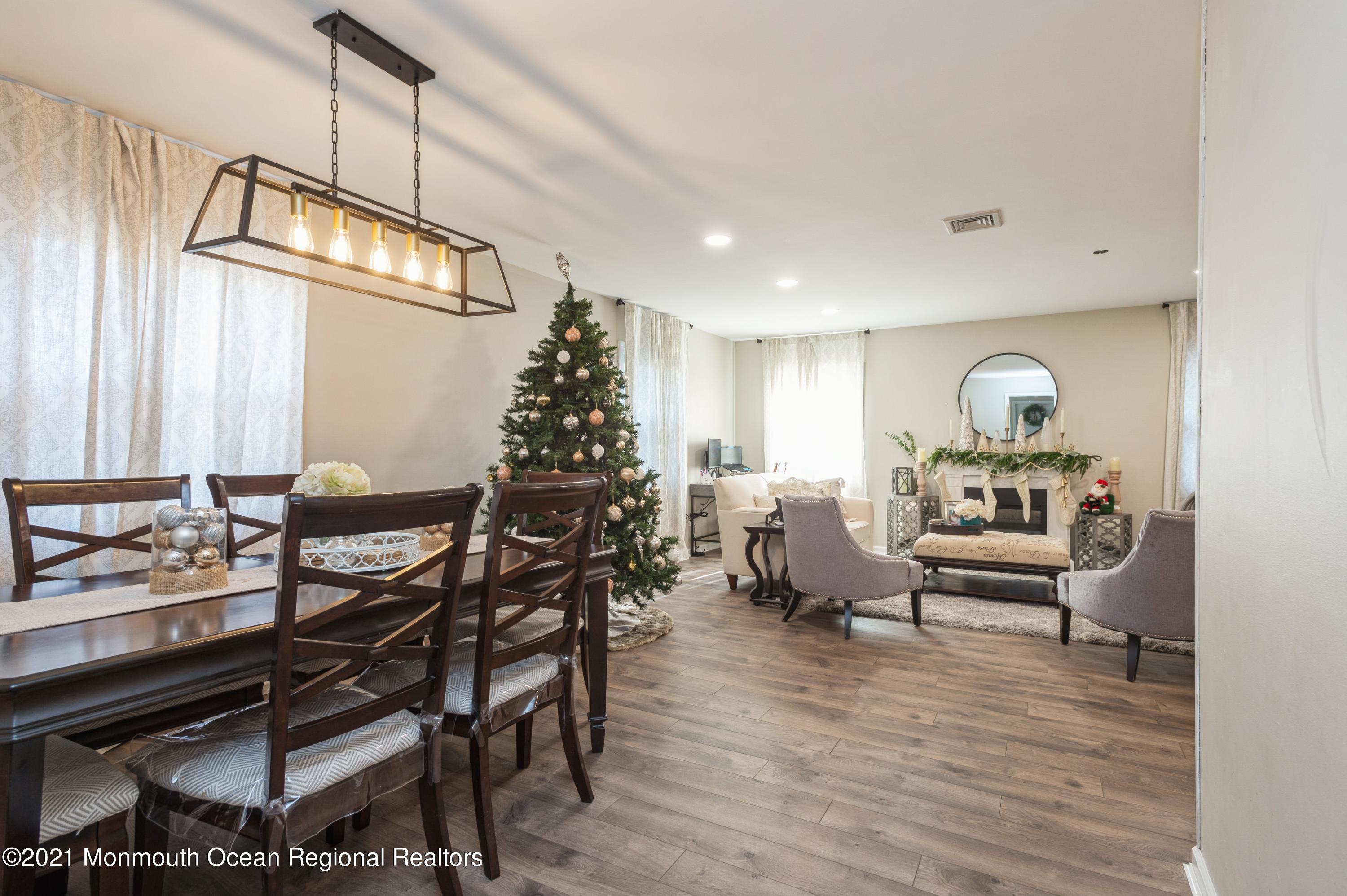 32 Canfield Lane Aberdeen, NJ 07747 - Photo 6 of 17 06_32CanfieldLane_93_LivingRoomDiningRoo