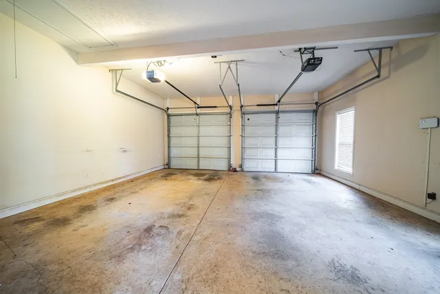 a view of a house with a tree