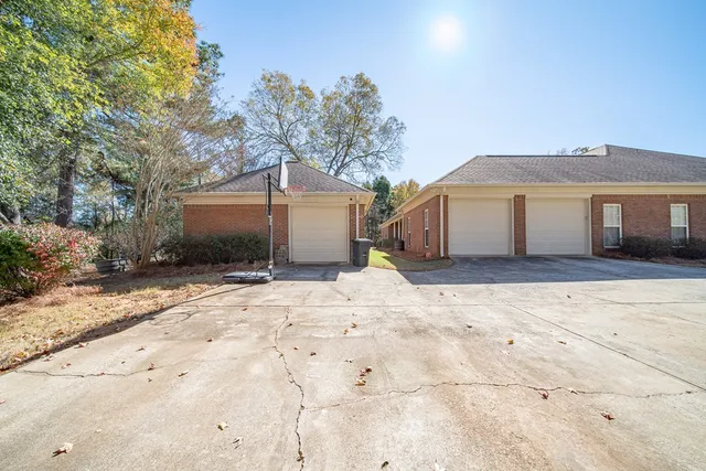 a view of a yard with trees