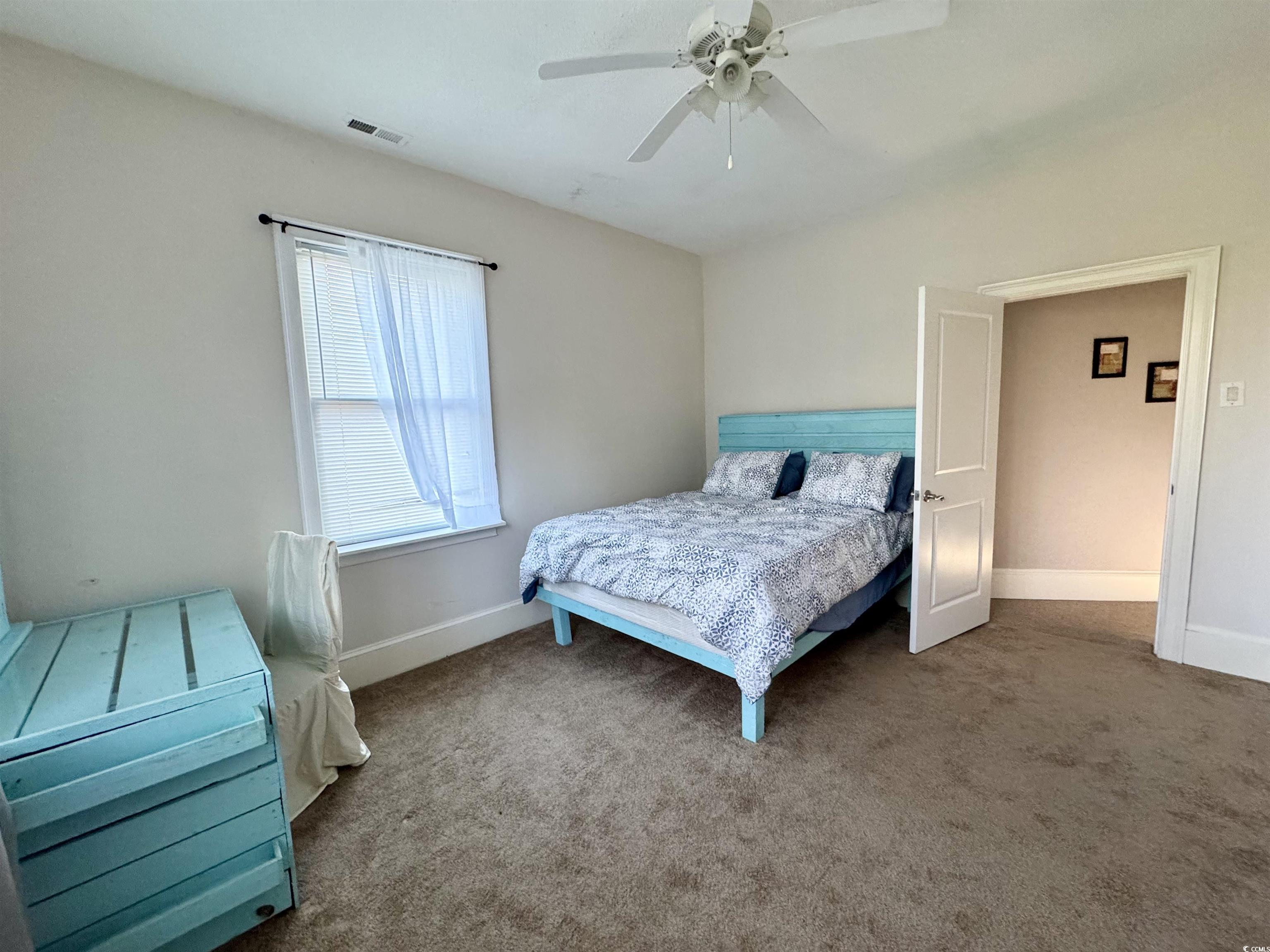 932 Duke Street Georgetown, SC 29440 - Photo 24 of 30 Carpeted bedroom with baseboards and ceiling fan