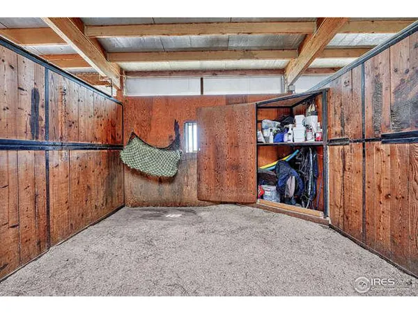 a view of a hallway with stairs