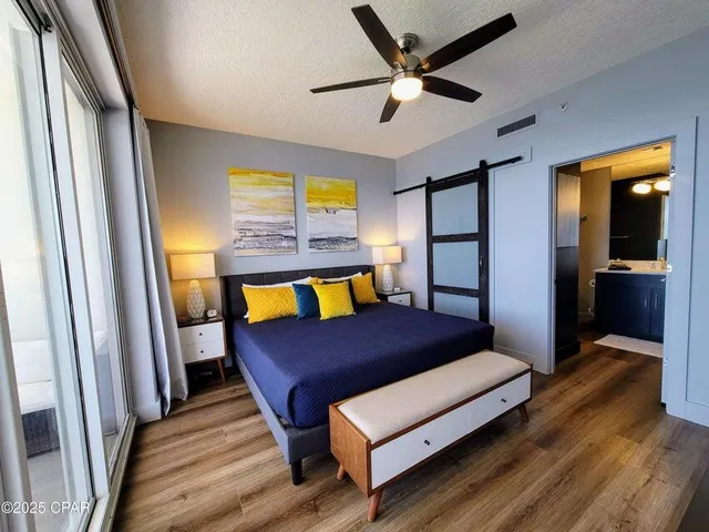 a bedroom with a bed and a walk in closet