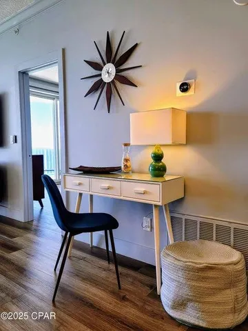 a view of a workspace with furniture