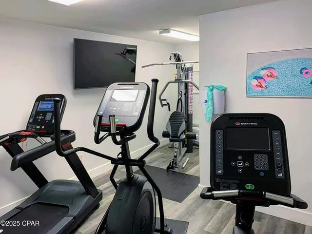 a view of a room with gym equipment