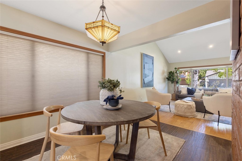 23950 Avenida Crescenta Valencia, CA 91355 - Photo 13 of 44 a view of a dining room with furniture and wooden floor