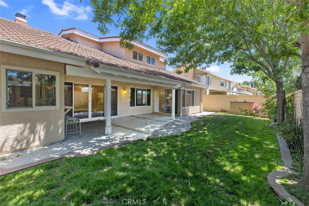 23950 Avenida Crescenta Valencia, CA 91355 - Photo 39 of 44 a view of a house with a yard and sitting area