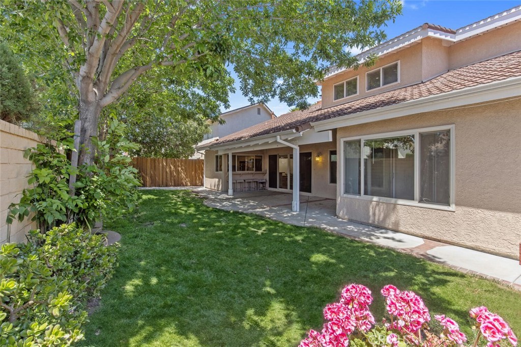 23950 Avenida Crescenta Valencia, CA 91355 - Photo 41 of 44 a view of a house with a yard