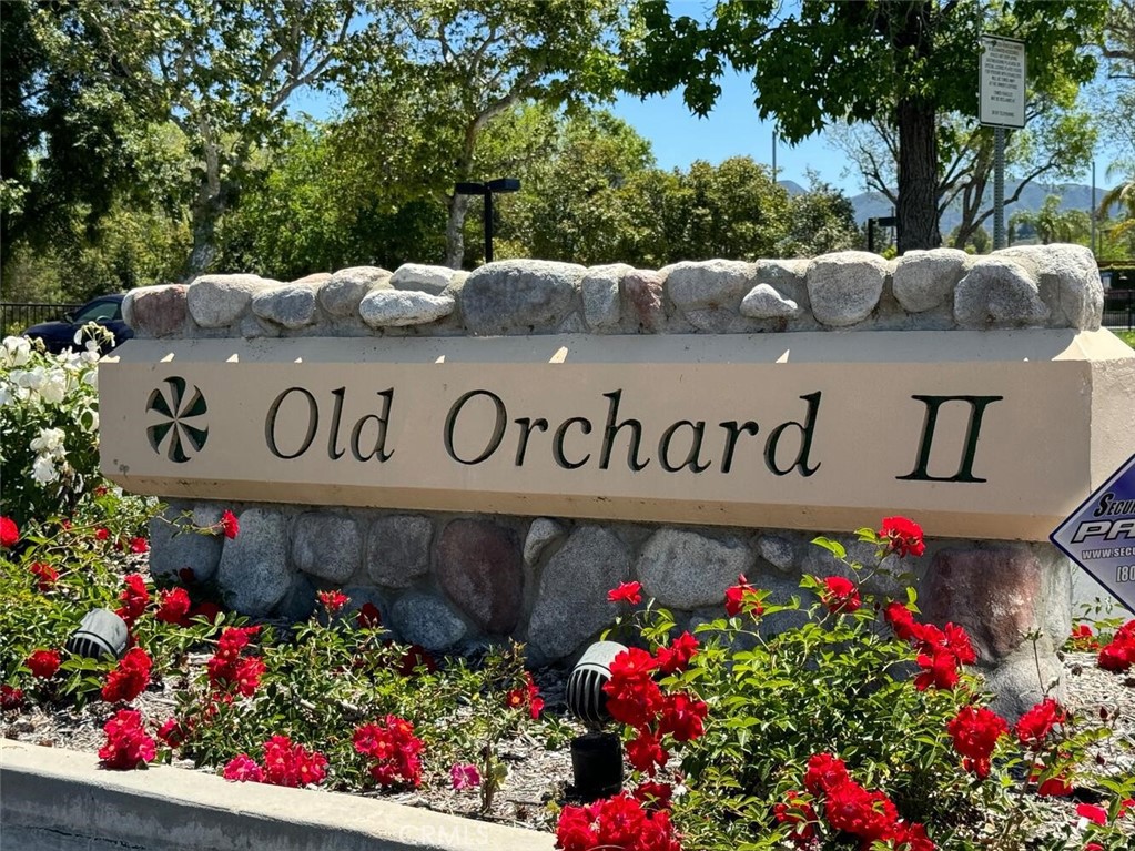 23950 Avenida Crescenta Valencia, CA 91355 - Photo 43 of 44 a view of sign board with flowers in the background