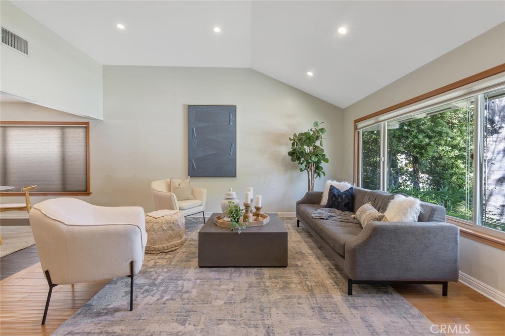 23950 Avenida Crescenta Valencia, CA 91355 - Photo 6 of 44 a living room with furniture and a large window