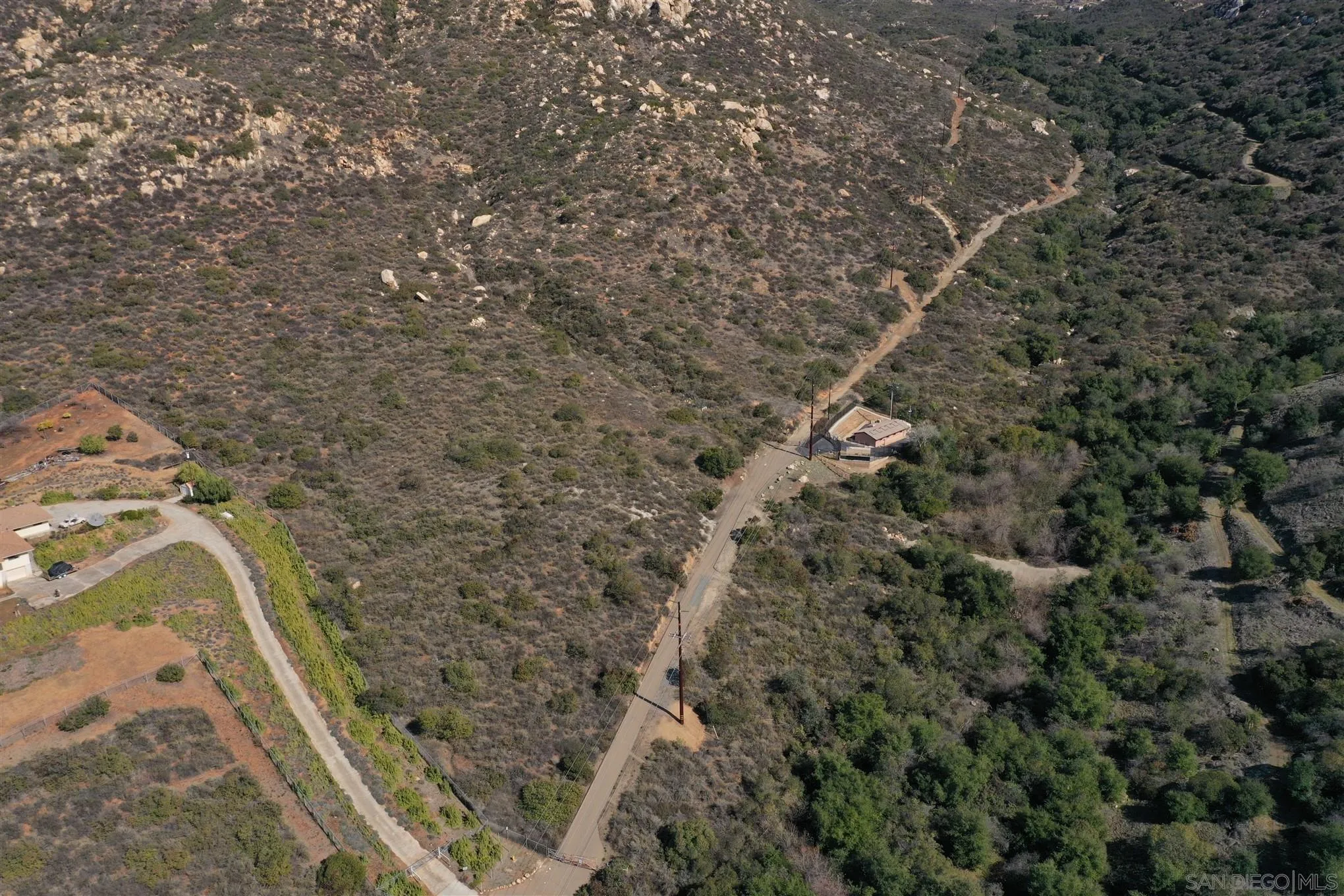 0 Rios Canyon Road, Unit PARCEL 1 El Cajon, CA 92021 - Photo 5 of 12 a view of a dry yard with wooden fence