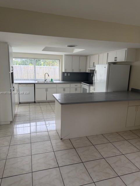 11000 Southwest 176th Street Miami, FL 33157 - Photo 8 of 13 a kitchen with a cabinets and window