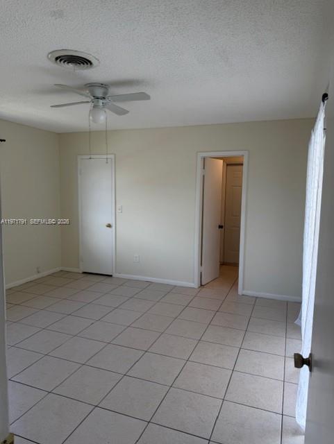 11000 Southwest 176th Street Miami, FL 33157 - Photo 10 of 13 a view of an empty room and a window