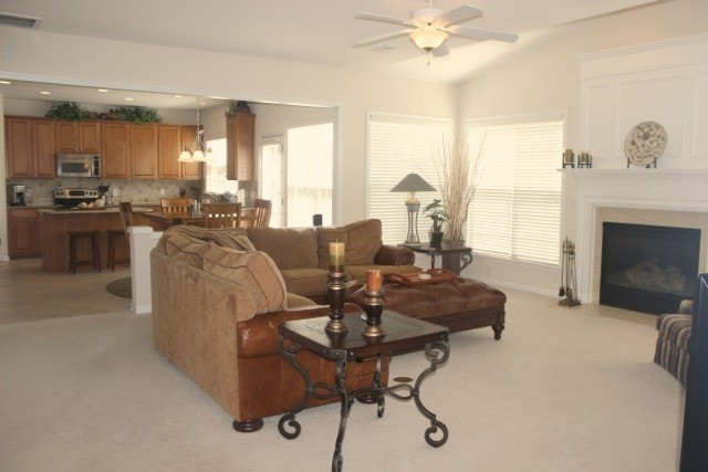7729 Silver View Lane Raleigh, NC 27613 - Photo 8 of 25 Very nice space in your family room with a fireplace to cozy up to! Family Room