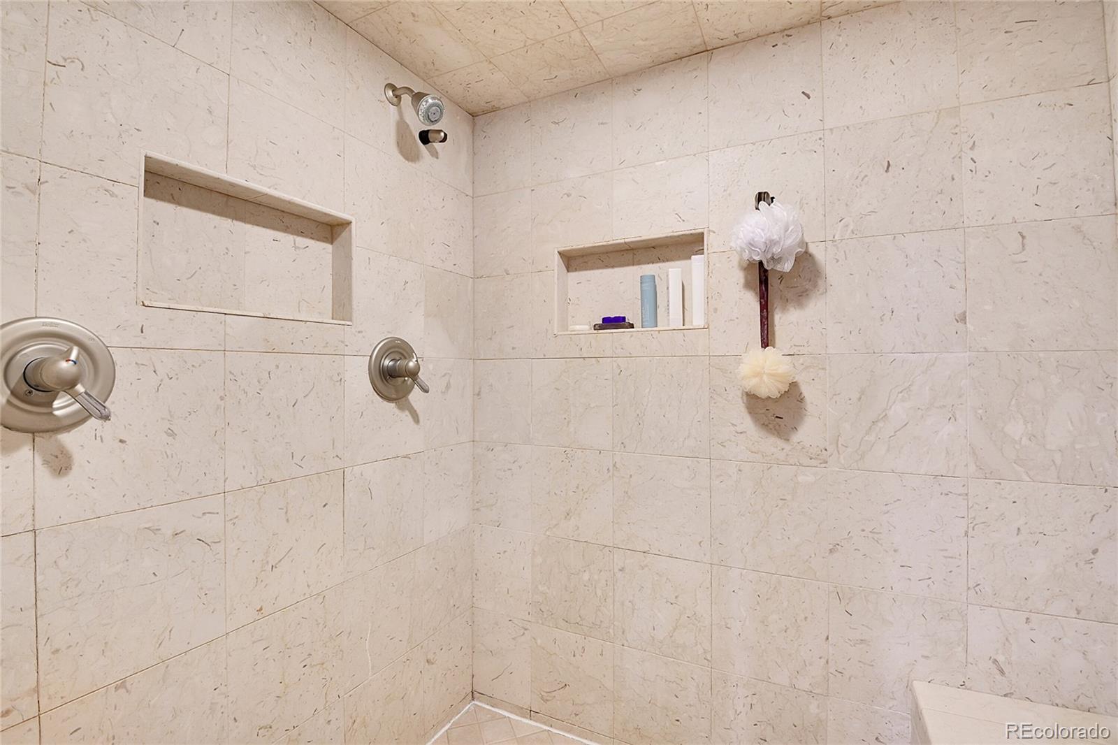 13082 South Wamblee Valley Road Conifer, CO 80433 - Photo 15 of 35 a bathroom with a shower