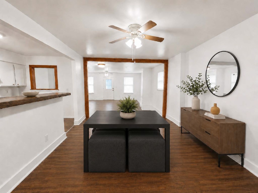 610 Gunter Street Austin, TX 78702 - Photo 16 of 16 Rich hardwood floors complement an open floorplan, creating an inviting dining space.