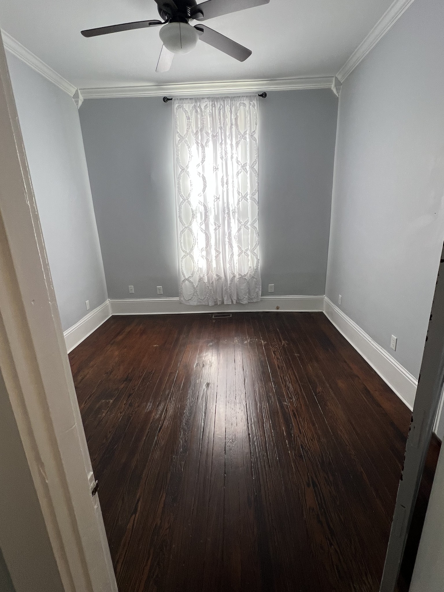 201 Pleasant Street Mount Pleasant, TN 38474 - Photo 21 of 38 wooden floor in an empty room with a window