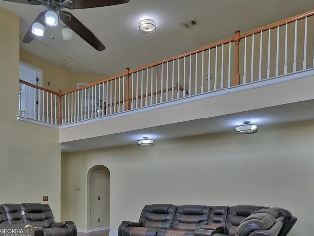 a view of a hallway view with staircase