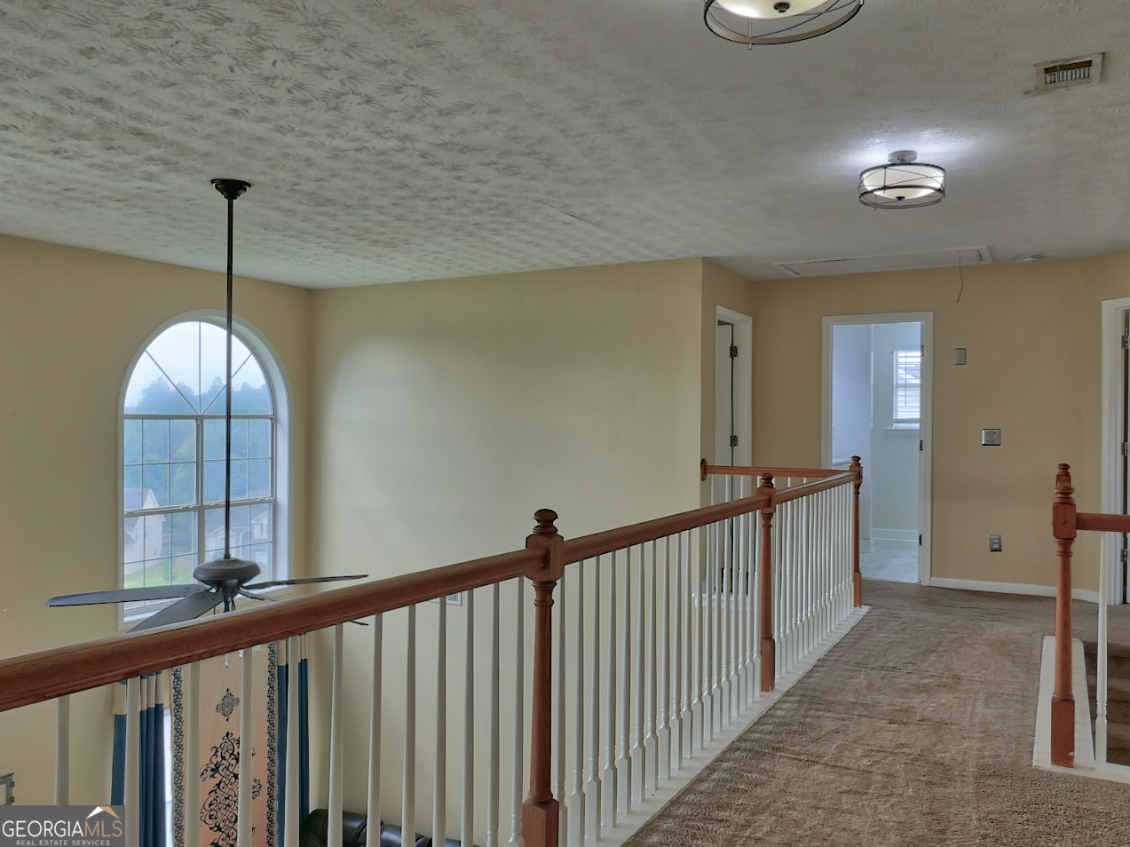 512 Chaucer Way Stockbridge, GA 30281 - Photo 14 of 25 a view of a hallway view with staircase