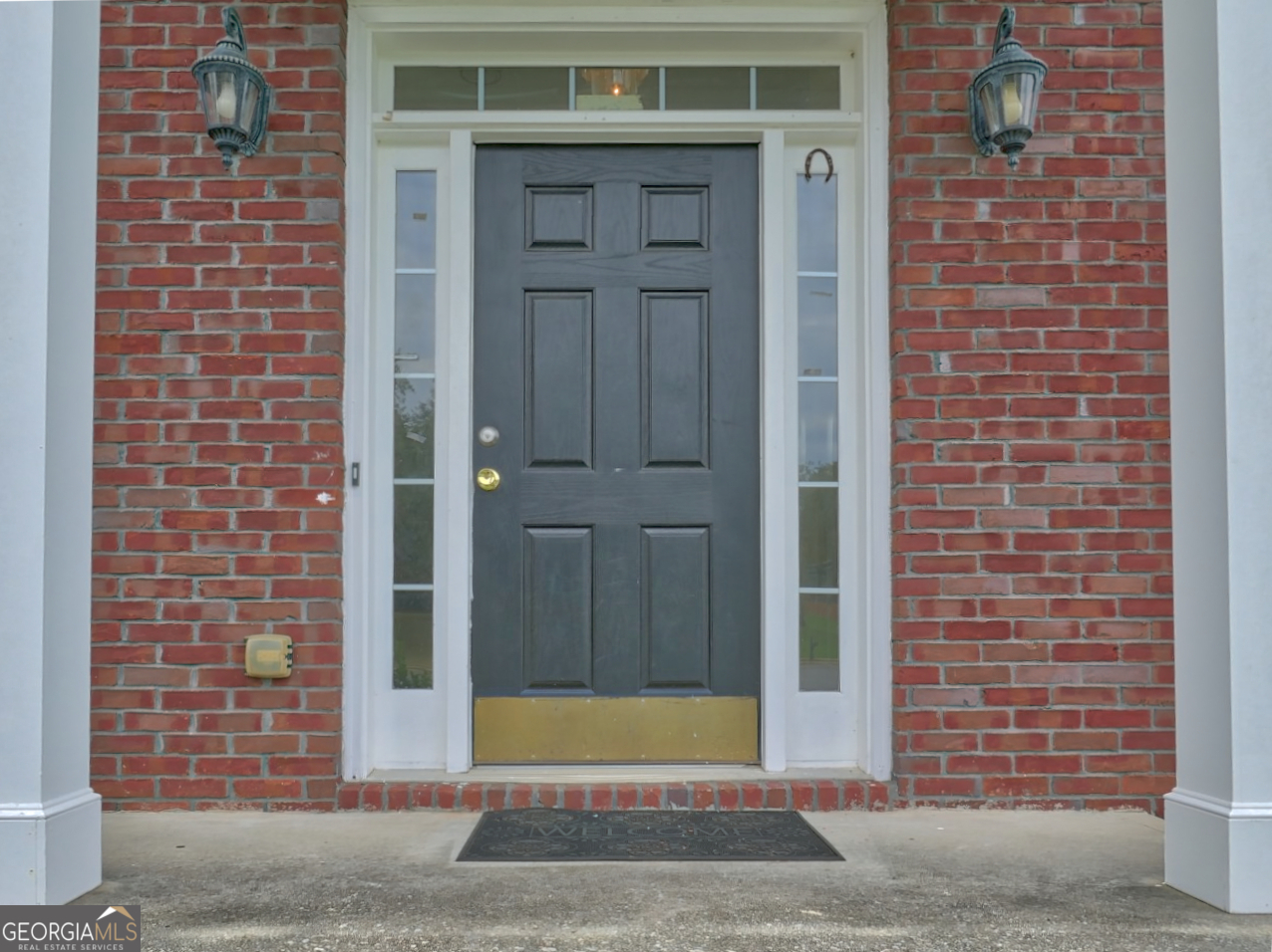 512 Chaucer Way Stockbridge, GA 30281 - Photo 2 of 25 a view of a brick house